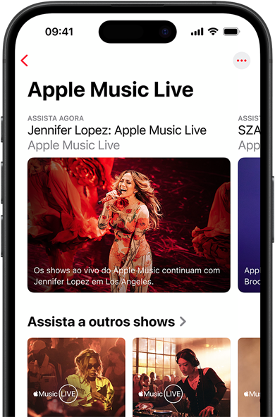 Tela do Apple Music Live no iPhone mostrando a aba Assista Agora, outros shows e conteúdo exclusivo, como os 100 melhores álbuns do Apple Music.