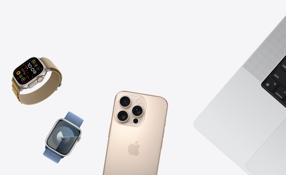 Various products in a scattered array, including Apple Watch in Natural with Tan Alpine Loop Band, Apple Watch in Silver with Periwinkle Sport Loop Band, iPhone in Desert Titanium, and MacBook in Silver