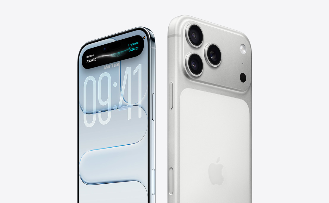 Due iPhone 16 Pro in titanio color sabbia, uno di fronte all’altro. Il primo mostra la parte posteriore con i tre obiettivi della fotocamera, il secondo mostra le funzioni della Dynamic Island nella parte superiore del display.
