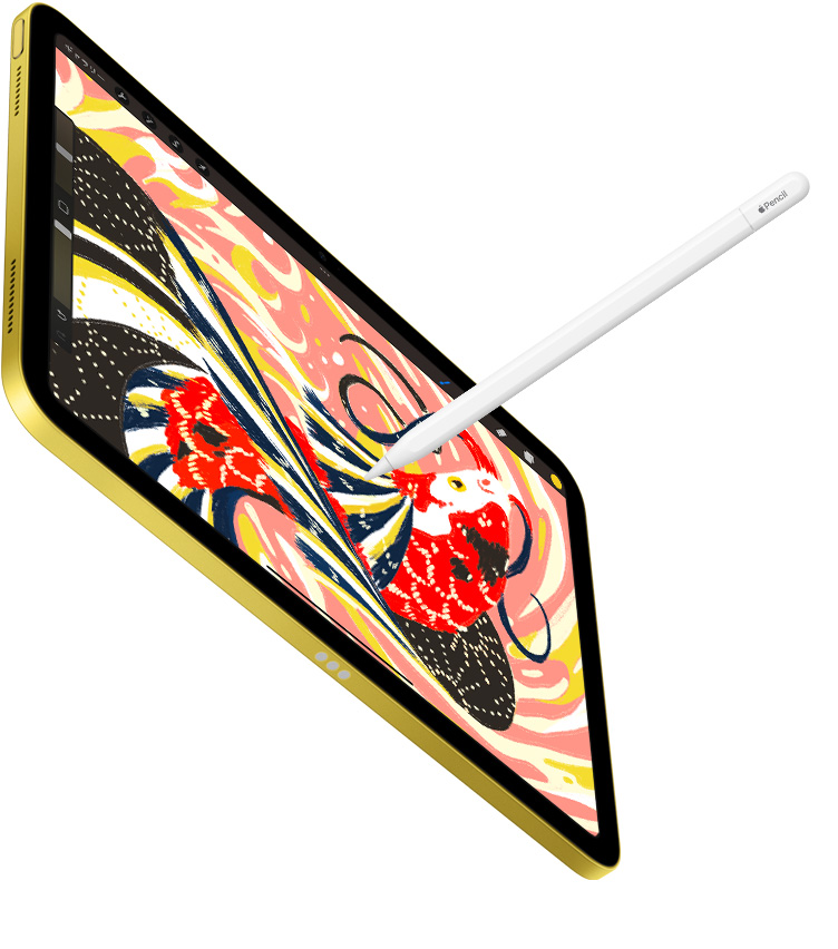 iPad上のProcreateアプリにカラフルな魚のイラストが表示されている。Apple Pencilを使ってiPad上に描き込んでいる