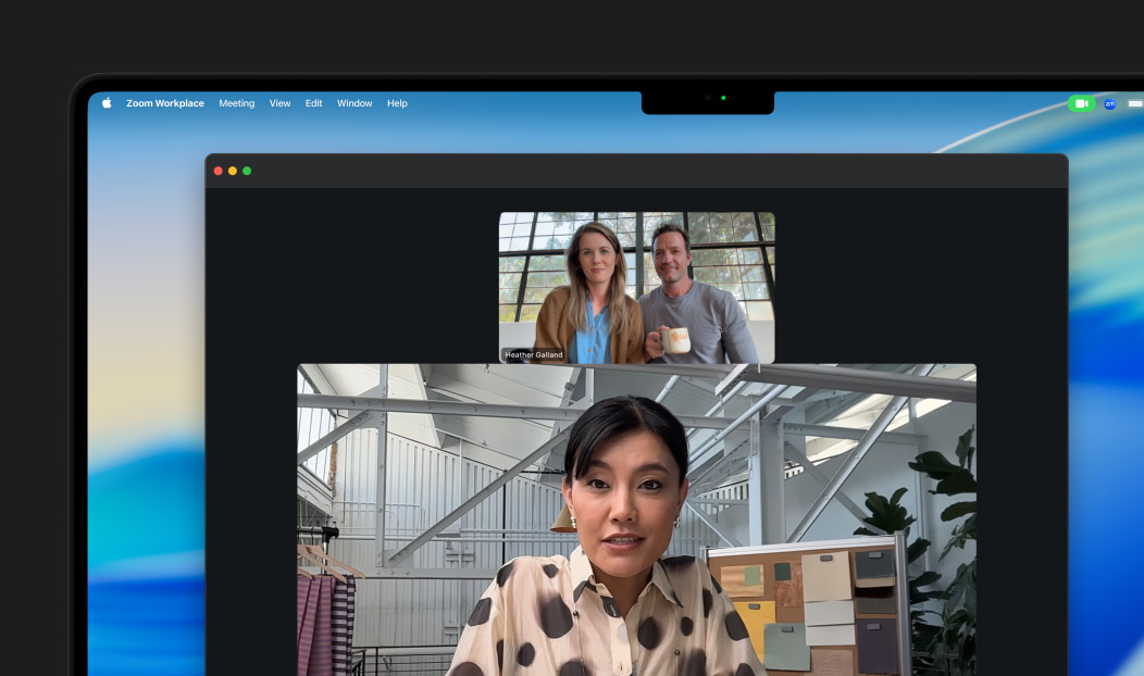 A video call on MacBook Pro, a woman talks to two people on the call, Center Stage keeps her centered in the frame