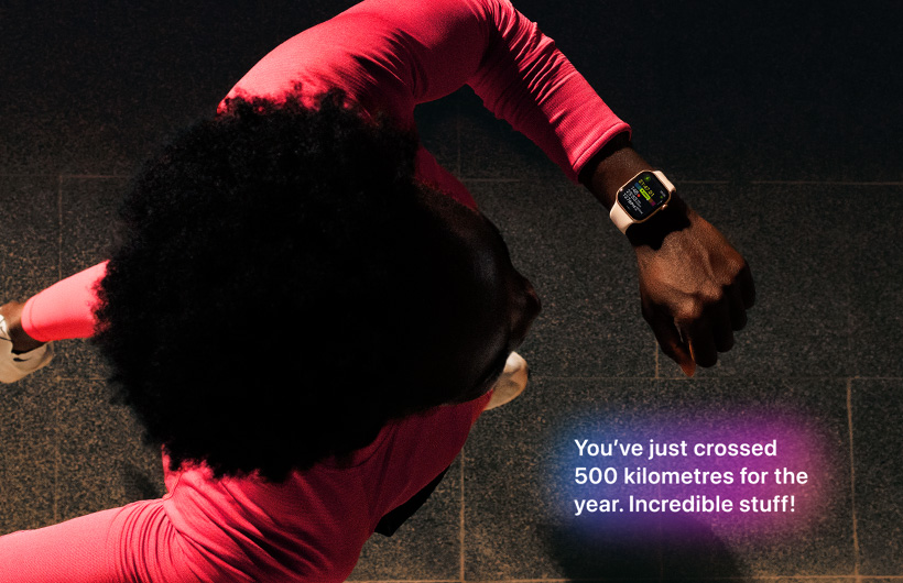 A person checks progress on Apple Watch Series 11 Workout app while running