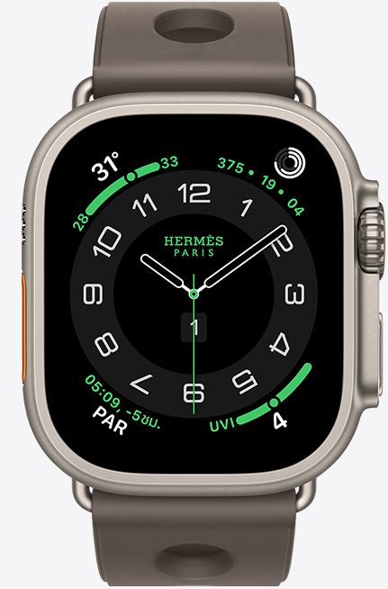 Apple Watch Hermès Ultra 3, titanium case, natural color, Hermès Circulaire watch face, complications: weather, activity rings, Paris time, UV index, right side exterior, Digital Crown, microphone, raised side button, Scub'H Diving band, gris titane color
