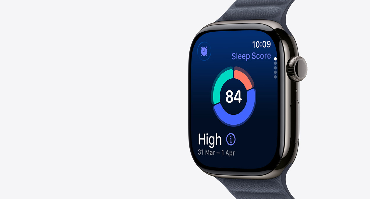 Apple Watch Series 11, slate colour, titanium case, screen shows sleep score circle graph, right side exterior, Digital Crown, strap, navy Magnetic Link