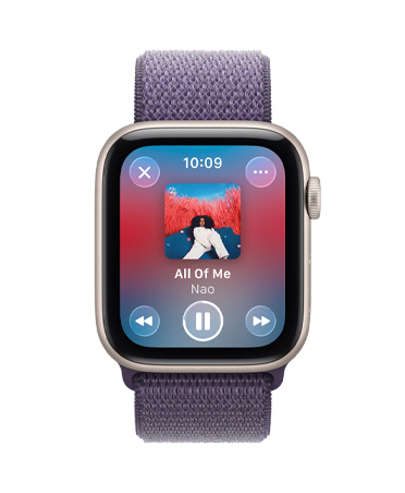 Apple Watch SE 3, cassa in alluminio color galassia, riproduzione di contenuti multimediali, Apple Music, lato destro, Digital Crown, cinturino Sport Loop viola nebbia