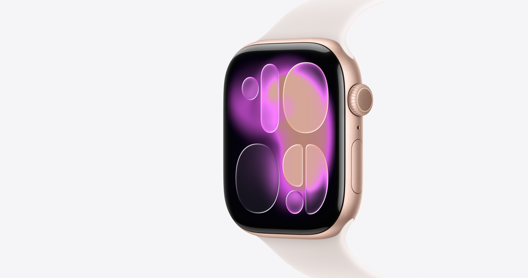 Apple Watch Series 11, Farbe Roségold, Aluminiumgehäuse, Flow Zifferblatt, rechte Seitenansicht, Digital Crown, Mikrofon, Seitentaste, Sportarmband, Farbe Blassrosa