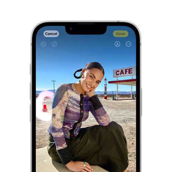 Apple Intelligence Clean Up tool highlighting a background object in a photo on iPhone 16e.