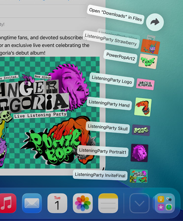 Pohled zblízka na Dock u spodního okraje, ze kterého je vertikálně rozbalený vějíř souborů
